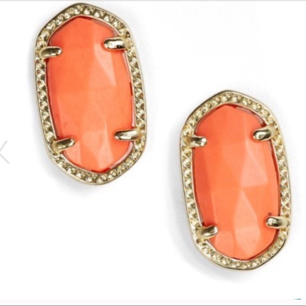 Kendra Scott orange earrings.